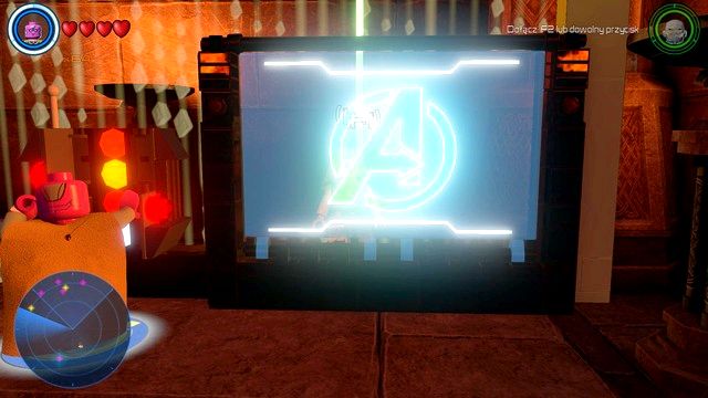 Once the console is powered, use it as Vision and use the parts displayed on the monitor to construct Avengers logo like the one shown on the above picture - Characters - Asgard - secrets - LEGO Marvels Avengers - Game Guide and Walkthrough